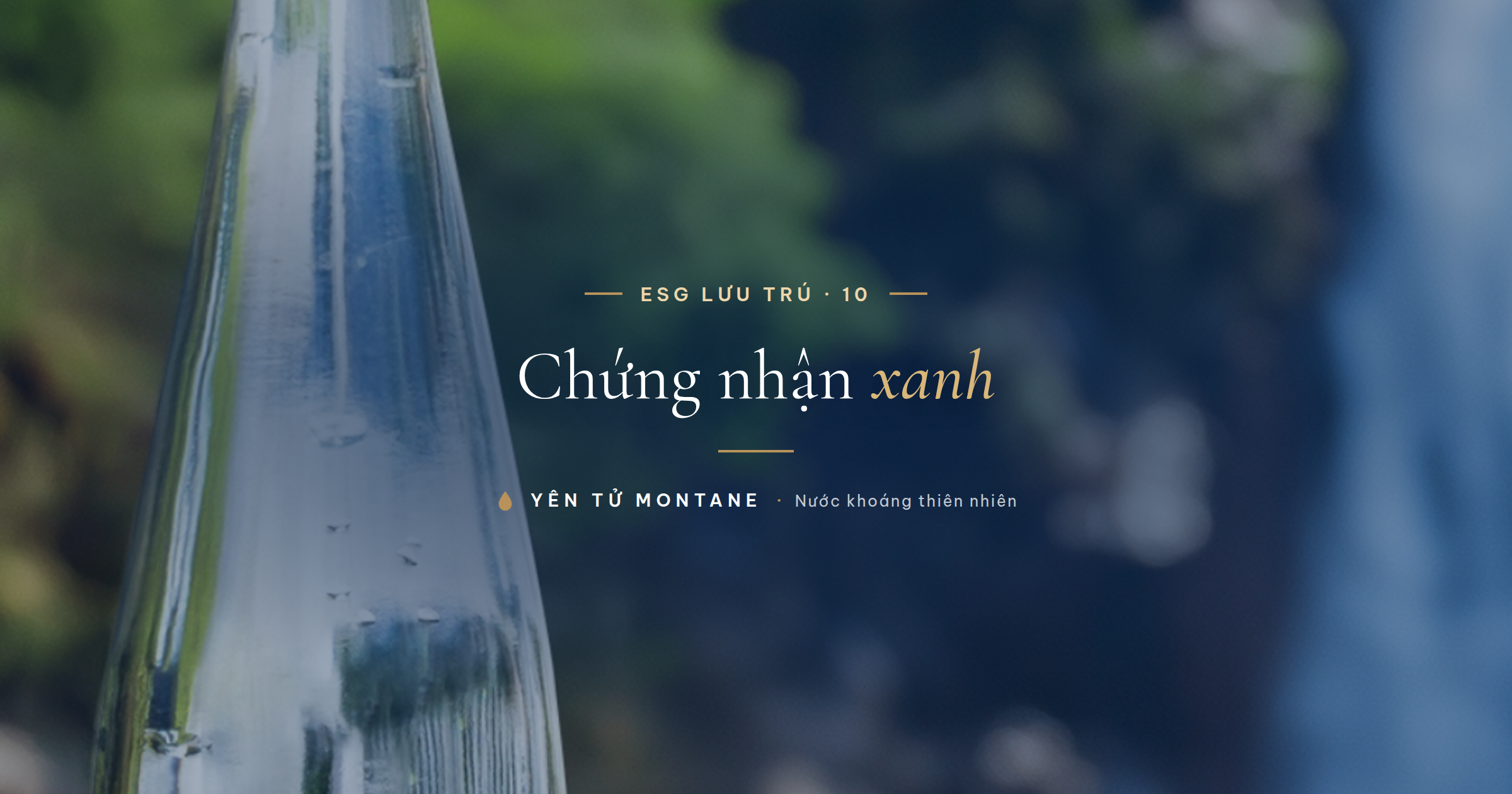 Chai thủy tinh Yên Tử Montane bên thác nước, biểu trưng chứng nhận xanh khách sạn